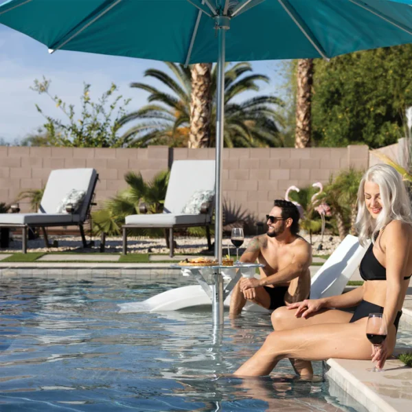 Couple enjoying the Bajmate lifestyle by the pool side