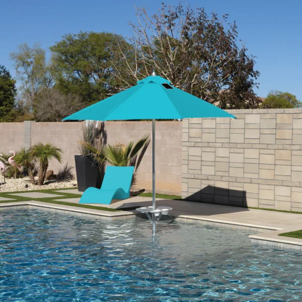 Close-up of a BajaMate Umbrella with a 2" silver aluminum pole and UV-resistant fabric in vibrant blue, showcasing its heavy-duty stainless steel crank mechanism and integrated 20-watt solar panel with a micro USB charging port for poolside use. The Teal umbrella