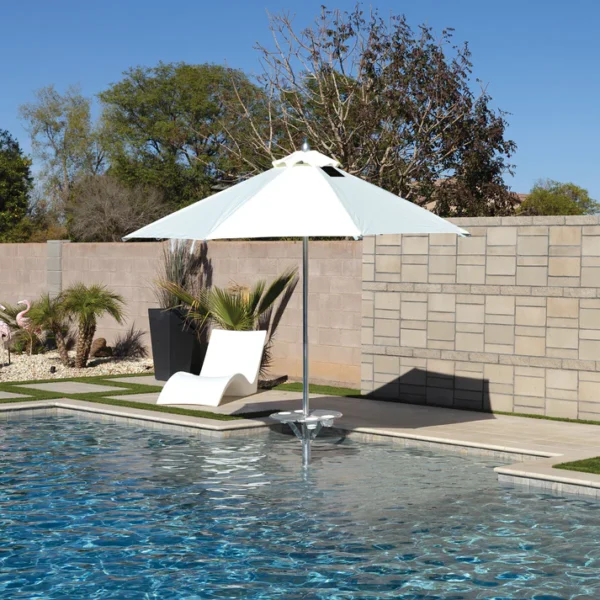 Close-up of a BajaMate Umbrella with a 2" silver aluminum pole and UV-resistant fabric in vibrant blue, showcasing its heavy-duty stainless steel crank mechanism and integrated 20-watt solar panel with a micro USB charging port for poolside use. The Tan umbrella